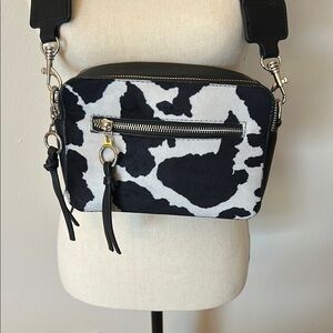 Sondra Robert’s Cow Print Crossbody Bag with Black Strap